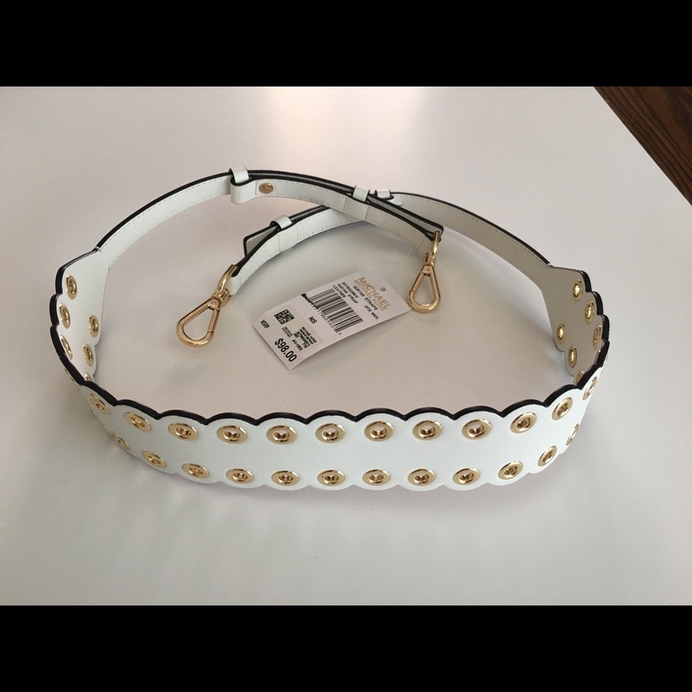 Michael Kor’s white leather strap